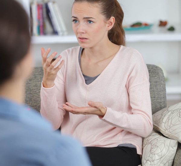 Emotional lady talking to therapist Emotional lady talking to therapist
